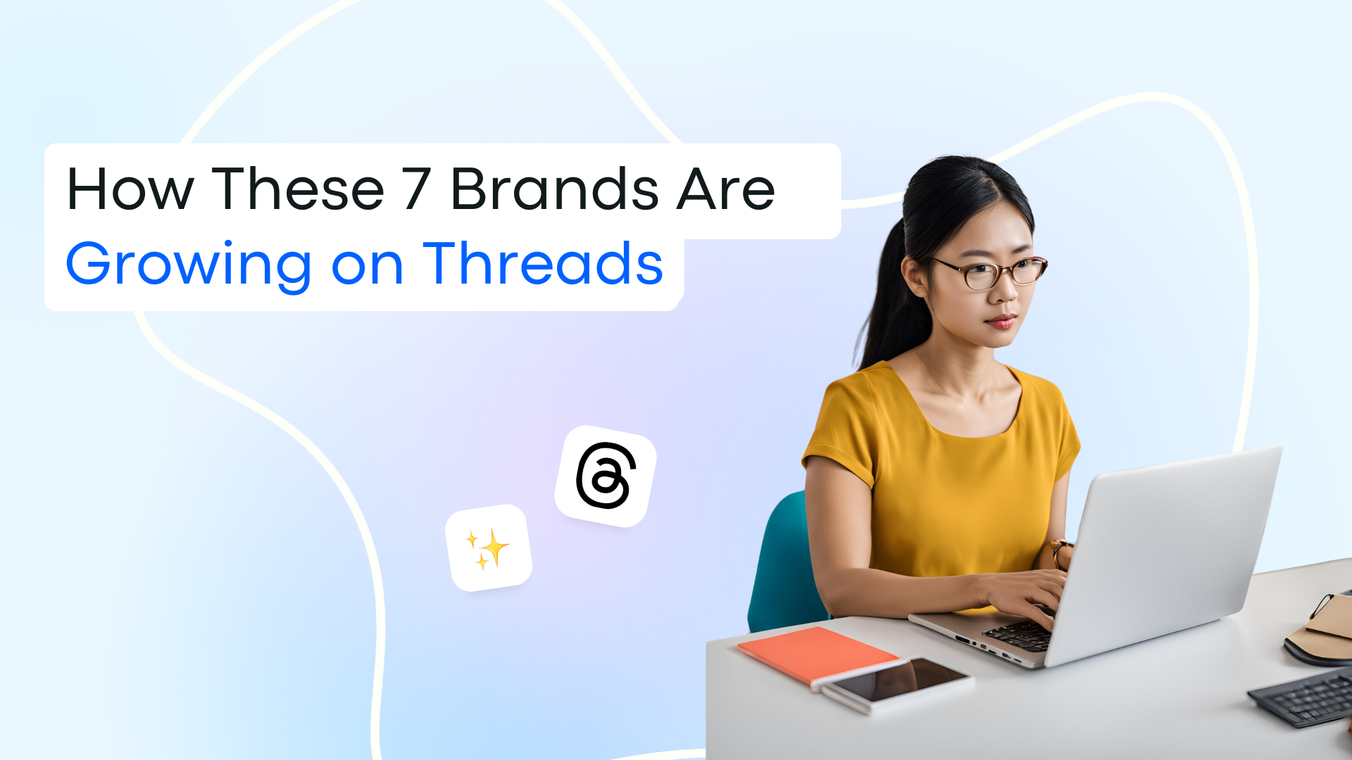 How These 7 Brands Are Growing on Threads. Woman types on laptop at computer.