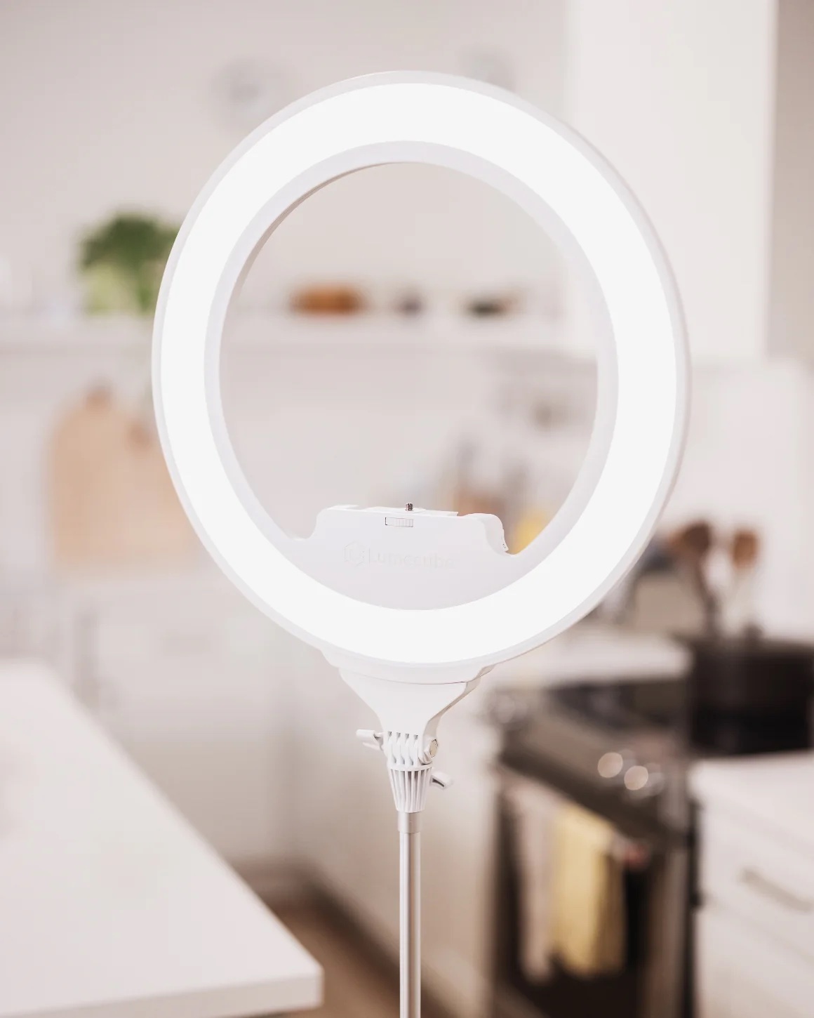 An image of a ring light set up in a kitchen for stunning indoor recording.