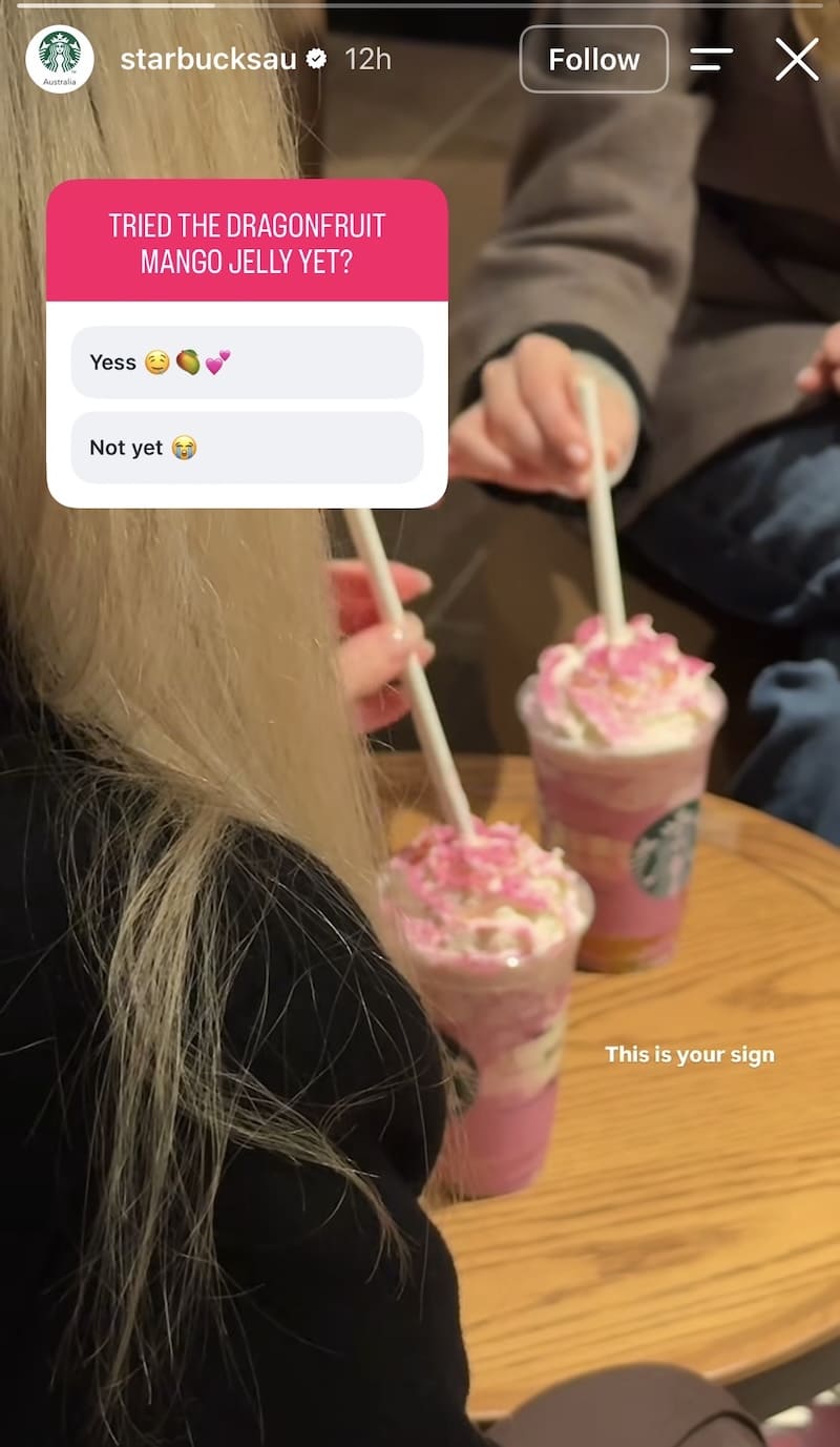 Behind-the-head shot of two customers with pink Dragonfruit drinks, yes/no poll sticker overlaid on image.