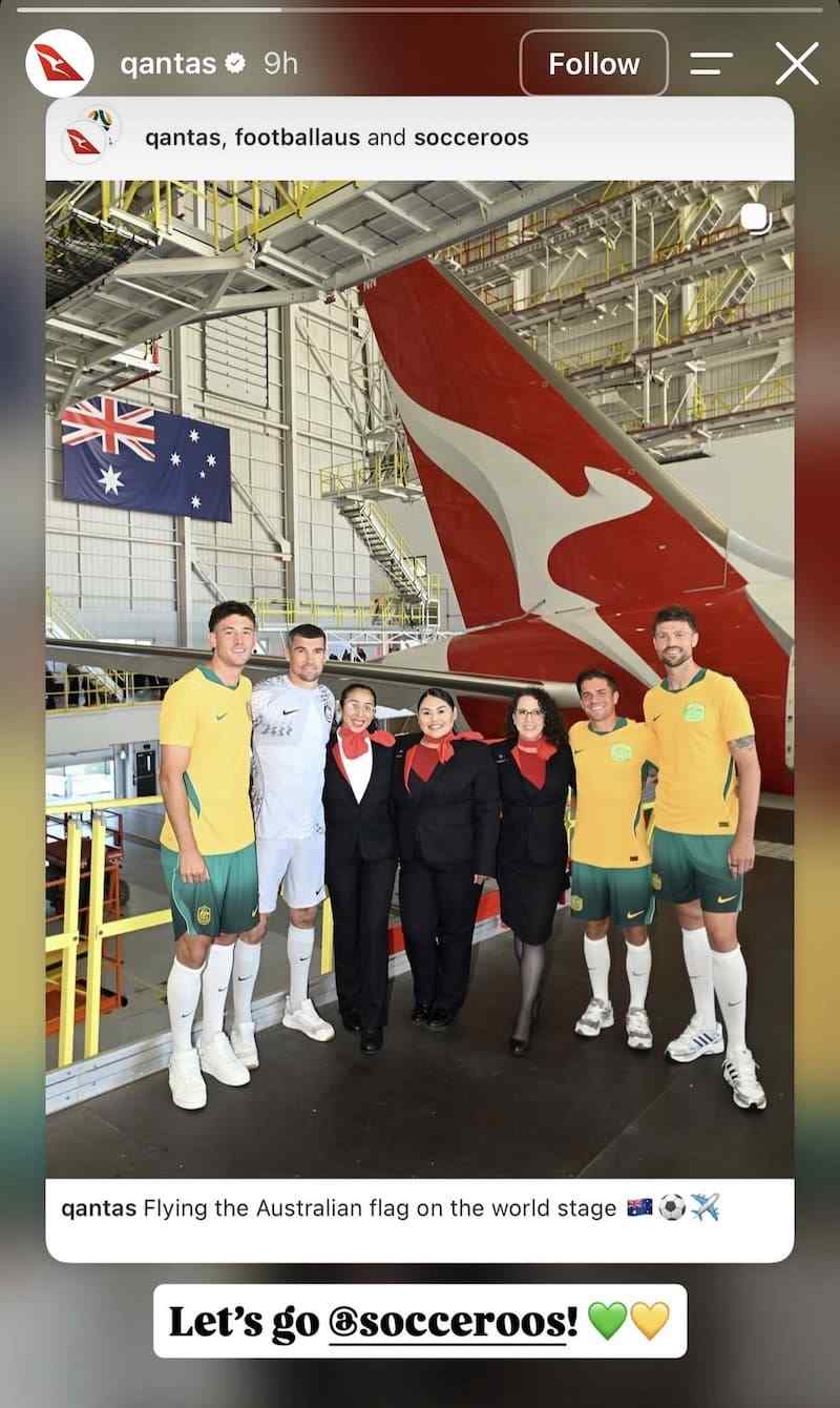 Socceroos players and Qantas crew in hangar under Australian flag, 'Let's go Socceroos' added Story layer.