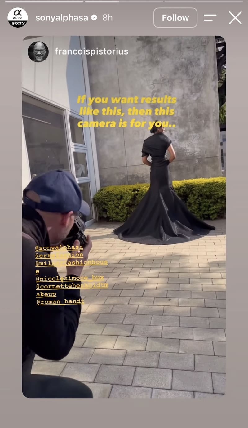 Creator shoots model in long black gown outdoors, yellow 'this camera is for you' text overlay on image.